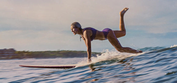 Kassia surfing